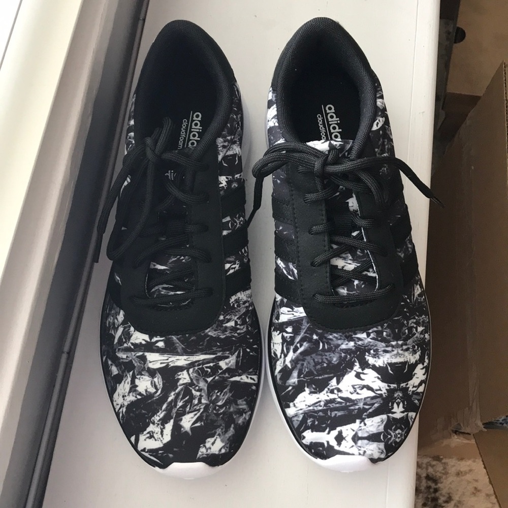 Never worn: Adidas women’s lite racer size 9